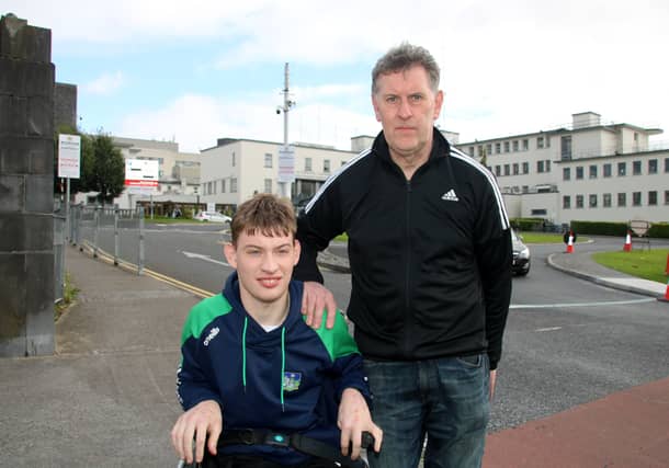 Sean Ryan, photographed with his son Darragh, following the 25-year-old’s experience in the hospital’s emergency unit | PICTURES: Adrian Butler