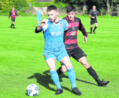 Aidan White, Nenagh AFC, controls the ball against Kieran Long, of Mungret Regional, in their Premier Division fixture at Mungret on Sunday | PICTURE: Brendan Gleeson