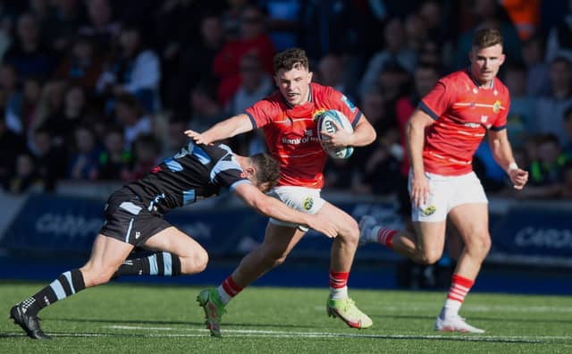 Calvin Nash of Munster is tackled by Tomos Williams of Cardiff during the United Rugby Championship match at Cardiff Arms Park. PIC: S