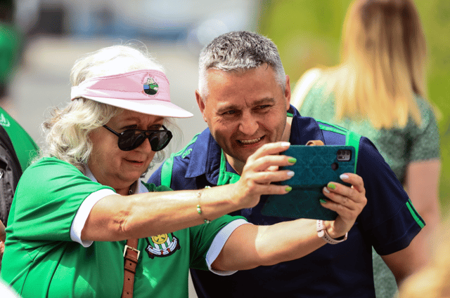 Former Limerick hurling star and manager TJ Ryan poses for a picture with a supporter ahead of last month's All-Ireland hurling final at Croke Park