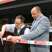 Jonathan Heslin with Padraig Broderick cutting the ribbon at Broderick's Official Opening, Croom PIC: Brendan Gleeson