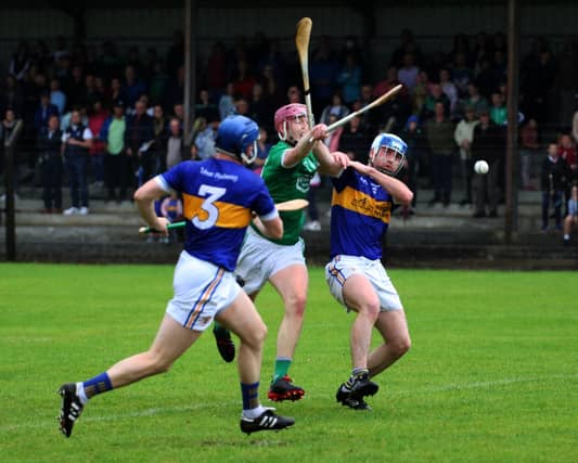 Action from Kilmallock and Patrickswell in Newcastle West. PIC: Brendan Gleeson