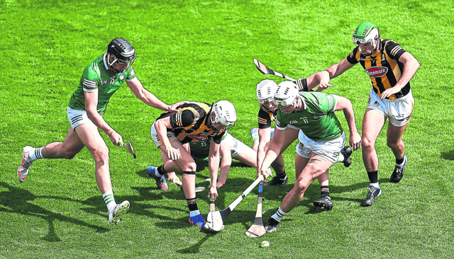Gearóid Hegarty, left, and Kyle Hayes, of Limerick in action against Kilkenny players, left to right, Cian Kenny, Conor Browne, and Paddy Deegan during Sunday's All-Ireland senior hurling final