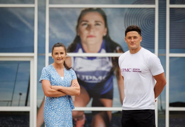 UPMC ambassadors, Lee Chin (Wexford hurler) and Phil Healy (Olympic athlete) attended the official opening of the new clinic | PICTURES: Andres Poveda