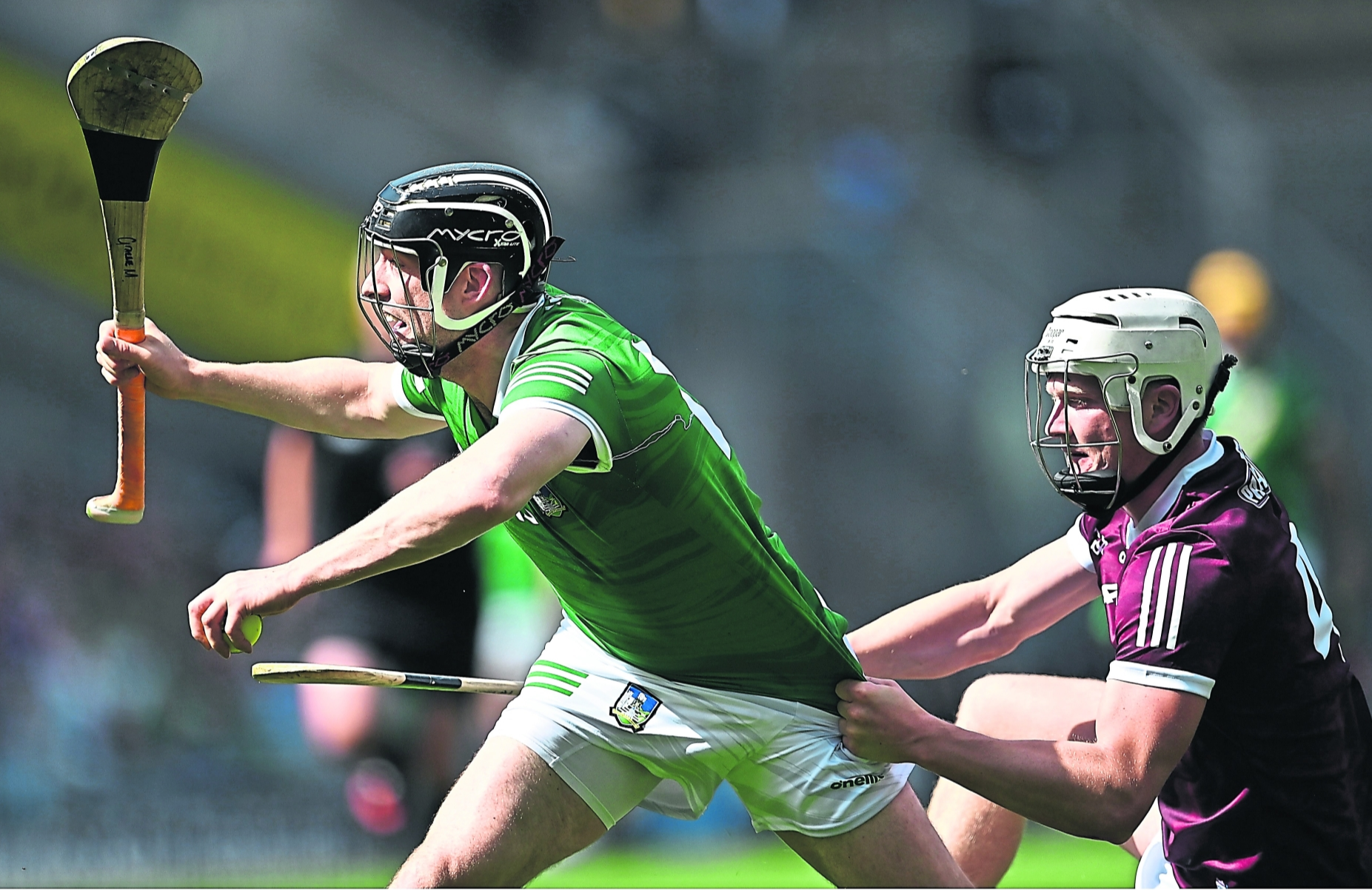 Limerick's Graeme Mulcahy is pulled back by Darren Morrissey, of Galway, during Sunday's All-Ireland hurling semi-final