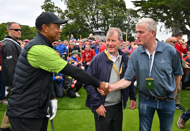 Tiger Woods and Limerick hurling manager John Kiely shake hands alongside JP McManus, centre, during day one of the JP McManus Pro-Am at Adare Manor Golf Club. PIC: Sportsfile