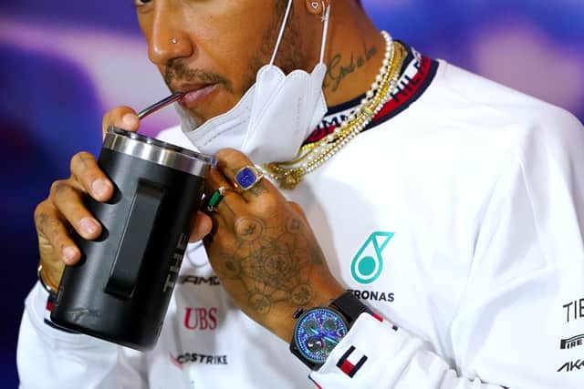 Hamilton conducted his media duties at Silverstone with the item of jewellery still in place, but the FIA has confirmed to the PA news agency that it has been taken it out for the opening action of the weekend.