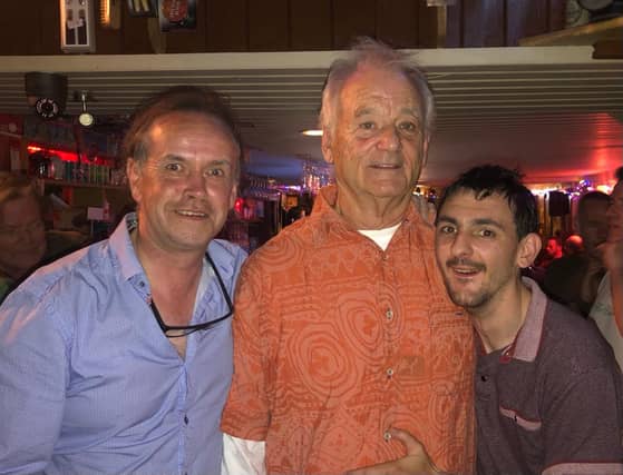 Hollywood acting royalty Bill Murray pictured with Paddy Kelly, owner of Charlie Malone's Bar and poet Mikey O'Doherty at the pub on Monday evening