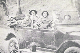The Holiday family with Capt Holiday (standing right) with which is reputed to be the first car to arrive in Limerick