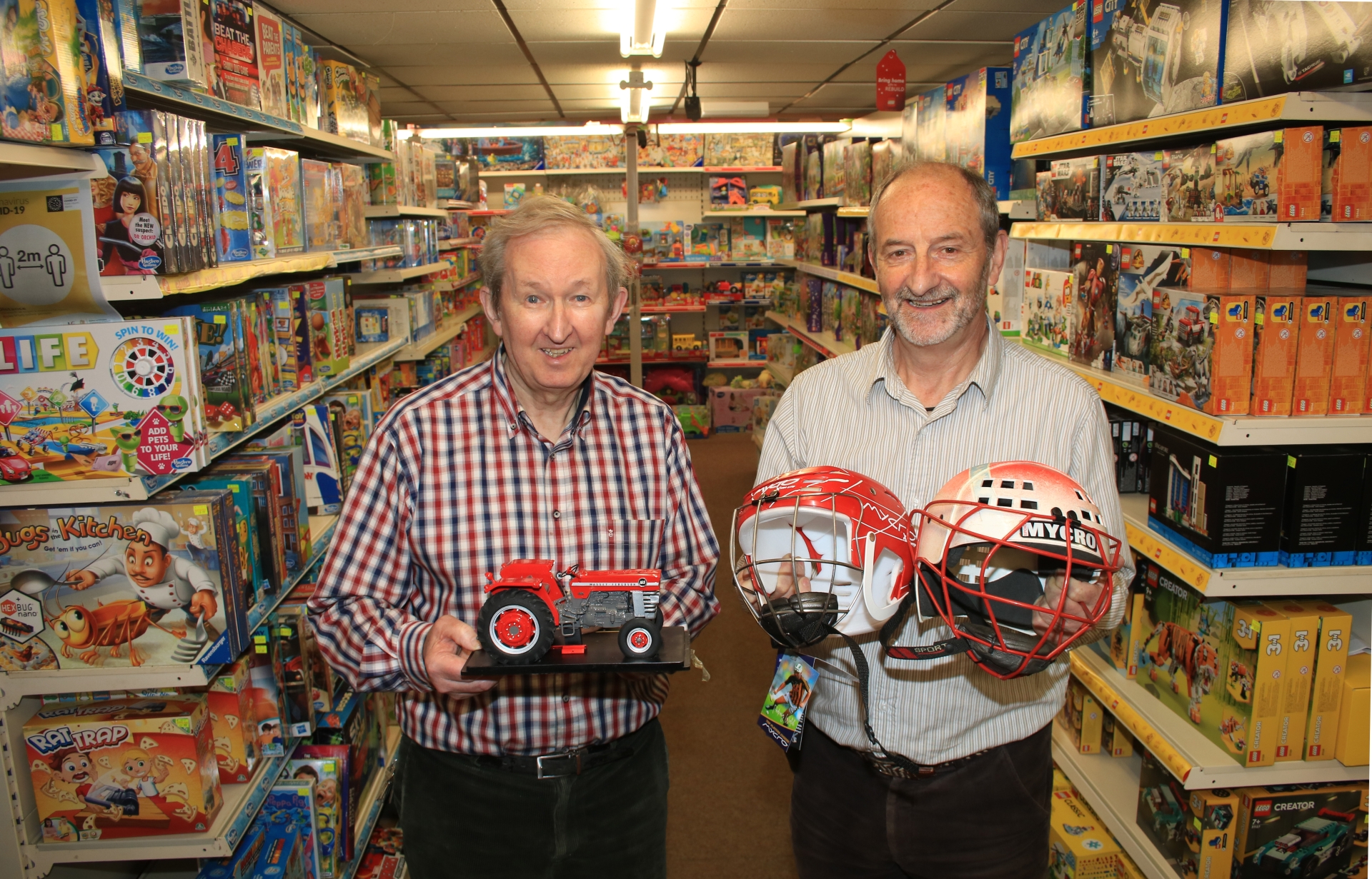 Jimmy and John Noonan with some of the toy tractors – always one of their most popular sellers | PICTURES: Adrian Butler