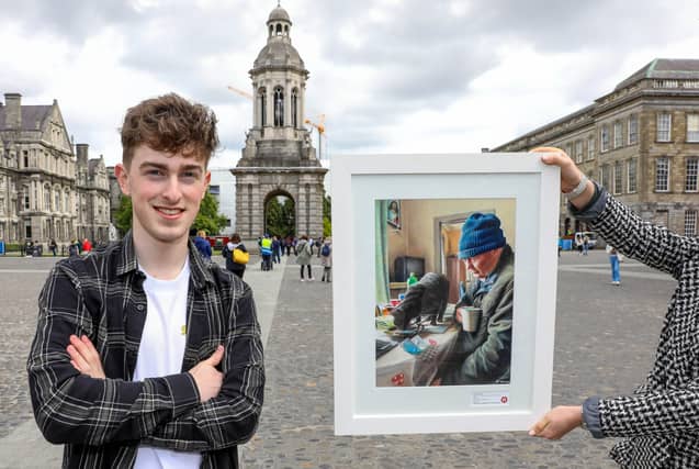 Artist Dan Killackey pictured with his prize-winning work 'Isolation'