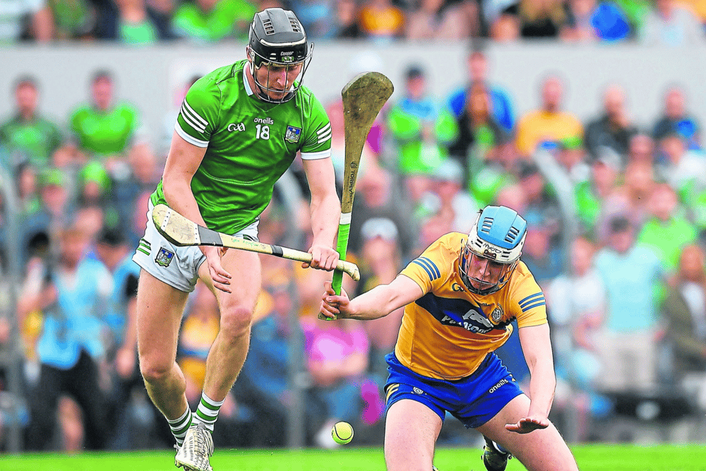 Limerick's Conor Boylan  is tackled by Diarmuid Ryan, of Clare, during the drawn Munster senior hurling championship round robin  fixture  at Cusack Park, Ennis on Sunday