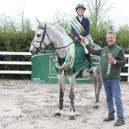 Robyn Moran receives her champion sash and prize from Raoul Masterson from TRM Picture: Laurence Dunne Jumpinaction.net Photography