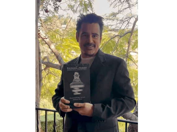 Colin Farrell with his Outstanding Talent award