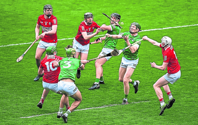 Limerick's William O'Donoghue in action against Shane Barrett, right, of Cork during the Munster SHC first round fixture at Páirc Uí Chaoimh on Sunday last