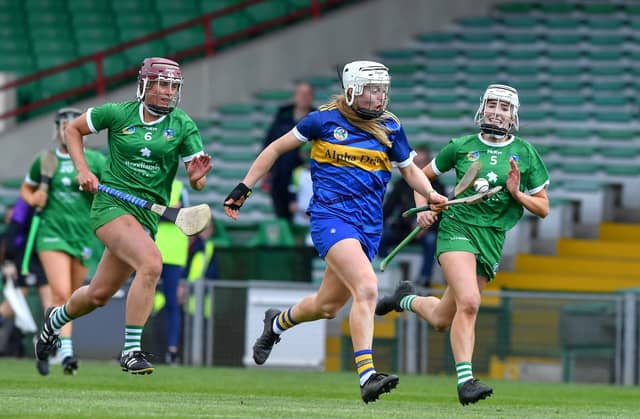 Limerick's Muireann Creamer and Mairead Ryan tackle Tipperary's Niamh Treacy in the TUS Gaelic Grounds. PIC; Sportsfile