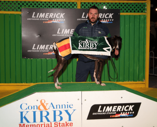 Finan Kennedy, with his dog, Droopys Edison who won his first round heat at the Con and Annie Kirby Memorial 525 at Limerick Greyhound Stadium Picture: Brendan Gleeson