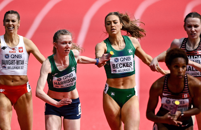 Emerald ACs Roisin Harrison, of Ireland, centre left, takes the baton from team-mate Sophie Becker during the 4x400m relay heats at the World Indoor Athletics Championships in Belgrade on Sunday