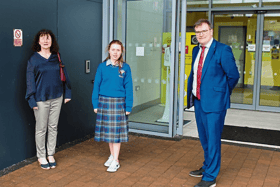 Bridgín O'Donnell with history teacher Mary Walsh Foley and school principal Liam Murphy