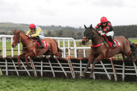 Smash The Lamp and Newcastle West jockey Gary Noonan (left) get the better of Ruhm Und Here to win at Punchestown on Monday last Picture: Caroline Norris/Racing Post