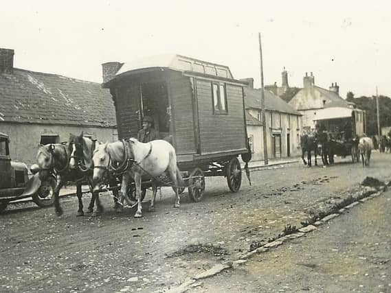 The circus arriving in Cappamore village, with horse-drawn carts and wagons, drawing in huge crowds upon its arrival