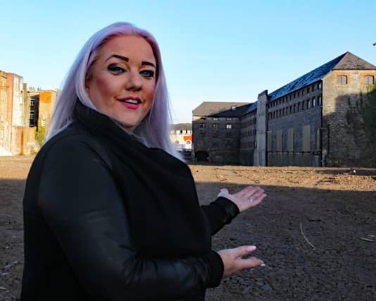 Former DJ Lorna D, looking at the construction site at the former Docs, and later Trinity Rooms nightclubs | PICTURES: Brendan Gleeson