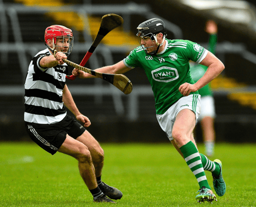 Kilmallock's Michael Houlihan in action against Padraig O'Keeffe, of Midleton, in the Munster club senior hurling semi-final at the TUS Gaelic Grounds