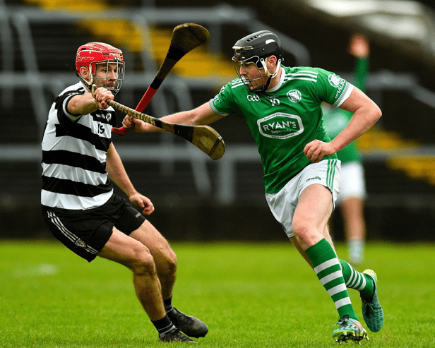 Kilmallock's Michael Houlihan in action against Padraig O'Keeffe, of Midleton, in the Munster club senior hurling semi-final at the TUS Gaelic Grounds