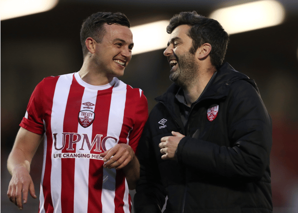 Treaty United defender Marc Ludden, left, with team manager Tommy Barrett