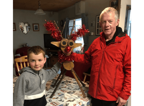 Mark Ryan and Jack Byrnes with one of the hand-made reindeer