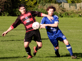 Patrick Ahern, of Mungret Regional, battles for possession with Liam Byrnes, of Ballynanty Rovers, in their FAI Junior Cup tie on Sunday Pic: Brendan Gleeson