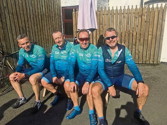 Dave Connolly, Joe Kiernan, John Daly all fell at the railway crossing during a charity cycle. Also pictured Ken Cahill