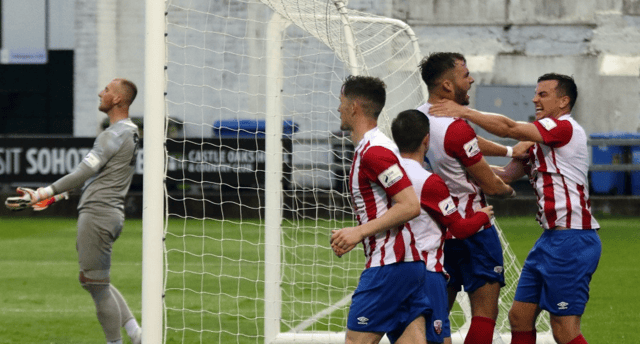 Treaty Utd players celebrate with goalscorer Clyde O'Connell after he headed home just before half-time Picture: Kieran Ryan-Benson