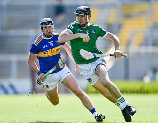Limerick's Diarmaid Byrnes advances past Tipperary's Alan Flynn in Pairc Ui Chaoimh. PIC: Sportsfile