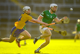 Limerick captain Jimmy Quilty wins possession ahead of Robin Mounsey. PIC: Sportsfile