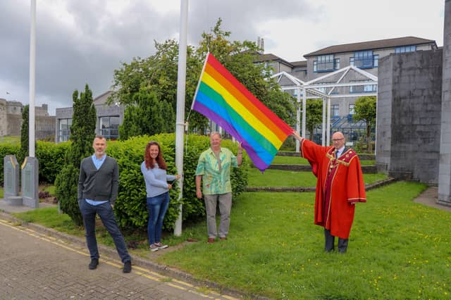 Richard Lynch, Lisa Daly and Jim Lawless of Limerick Pride 2021 with Mayor Michael Collins at the flag-raising ceremony