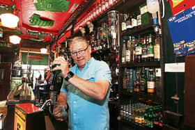 A pint of the black stuff: Padraig Power of Bradshaws in Castleconnell gears up for Monday  PICTURE: BRENDAN GLEESON