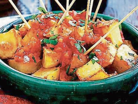 Patatas bravas translates to 'spicy potatoes'