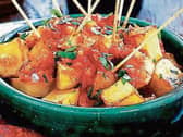 Patatas bravas  translates to  'spicy potatoes'