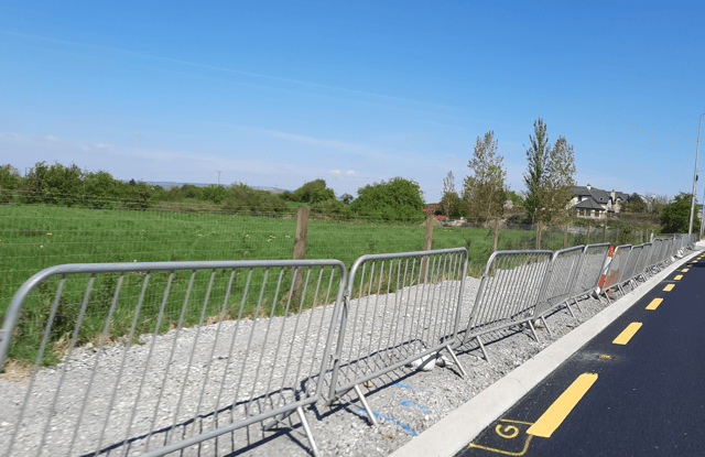 A semi-permanent macadam surface is to be laid