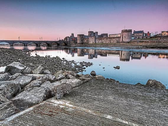 Popular Limerick tourist attraction King John's Castle photographed under a dusk sky | PICTURE: CATHERINE WALSH
