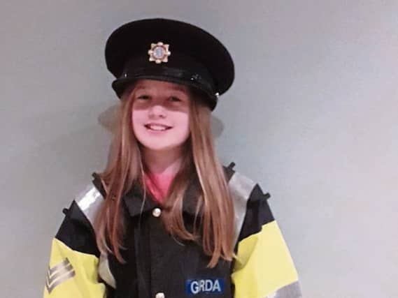 Next stop Templemore: This photograph of Emma Kiely, aged 9, from Galbally will be priceless if she does follow her dream to become a garda in the years to come