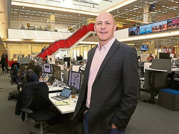 Malachy Browne in the newsroom of the New York Times