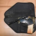 An improvised firearm and 88 rounds of ammunition were seized