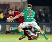 Munster's JJ Hanrahan is tackled by Federico Ruzza of Benetton Treviso in their 2019 Guinness PRO14 fixture at Stadio Monigo