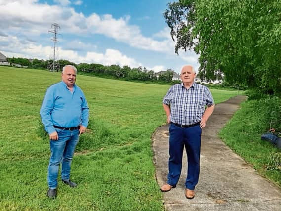 Cllr Fergus Kilcoyne and local resident Joseph Burke