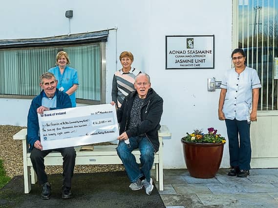Jimmy McEnery, Friends of St Ita’s committee member, being presented with a cheque for €4,278 with Helen Galvin, St Ita’s; Maura Liston, Friends of St Ita’s and Princy Varghese, St Ita's,