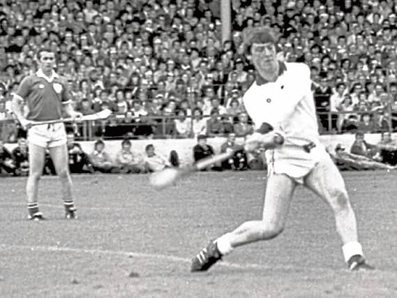 Like father, like son: Tommy Quaid gives a mighty clearance during the Munster Final against Clare in 1981