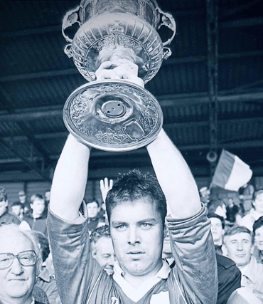 Limerick captain Joe O'Connor lifts the trophy aloft after his side's dramatic 1992 National Hurling League final victory over Tipperary