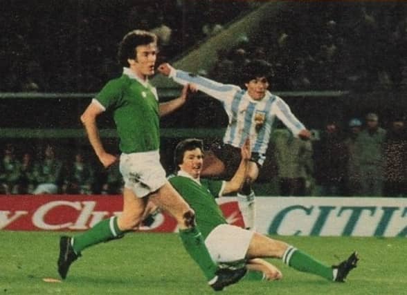 Limerick man Pat Nolan, centre, tries to block a shot on goal from the late Diego Maradona during a League of Ireland XI fixture with world champions Argentina at River Plate Stadium in 1980